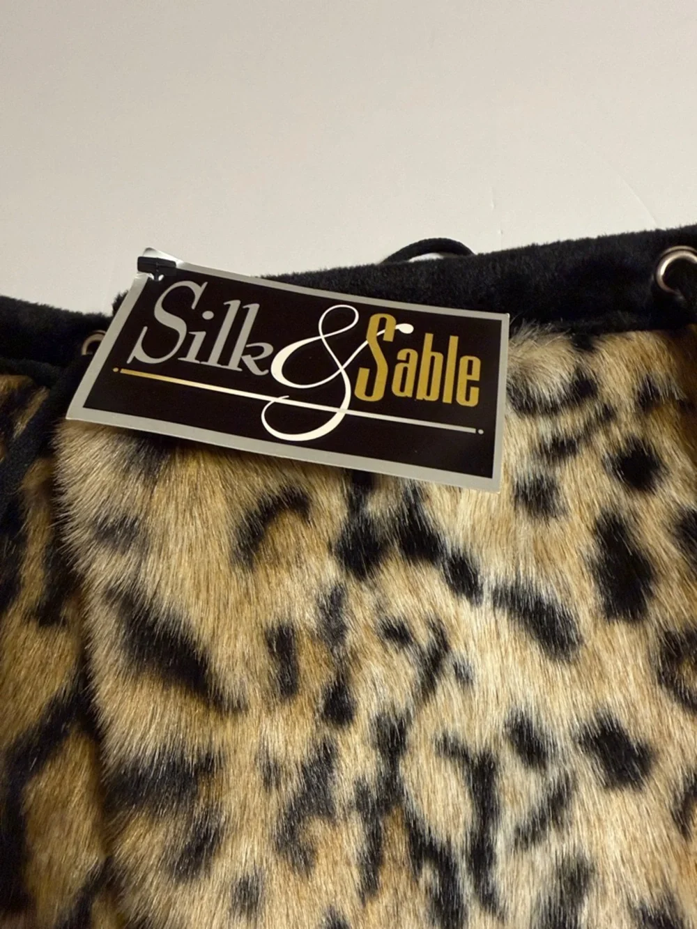 Silk & Sable. Faux Fur Leopard Print Leg Warmers - Black & Tan